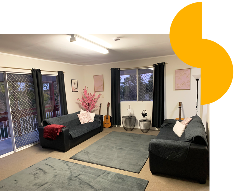 image of residential care with couches and rugs